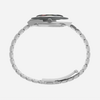 Close-up of a silver watch band on a white background