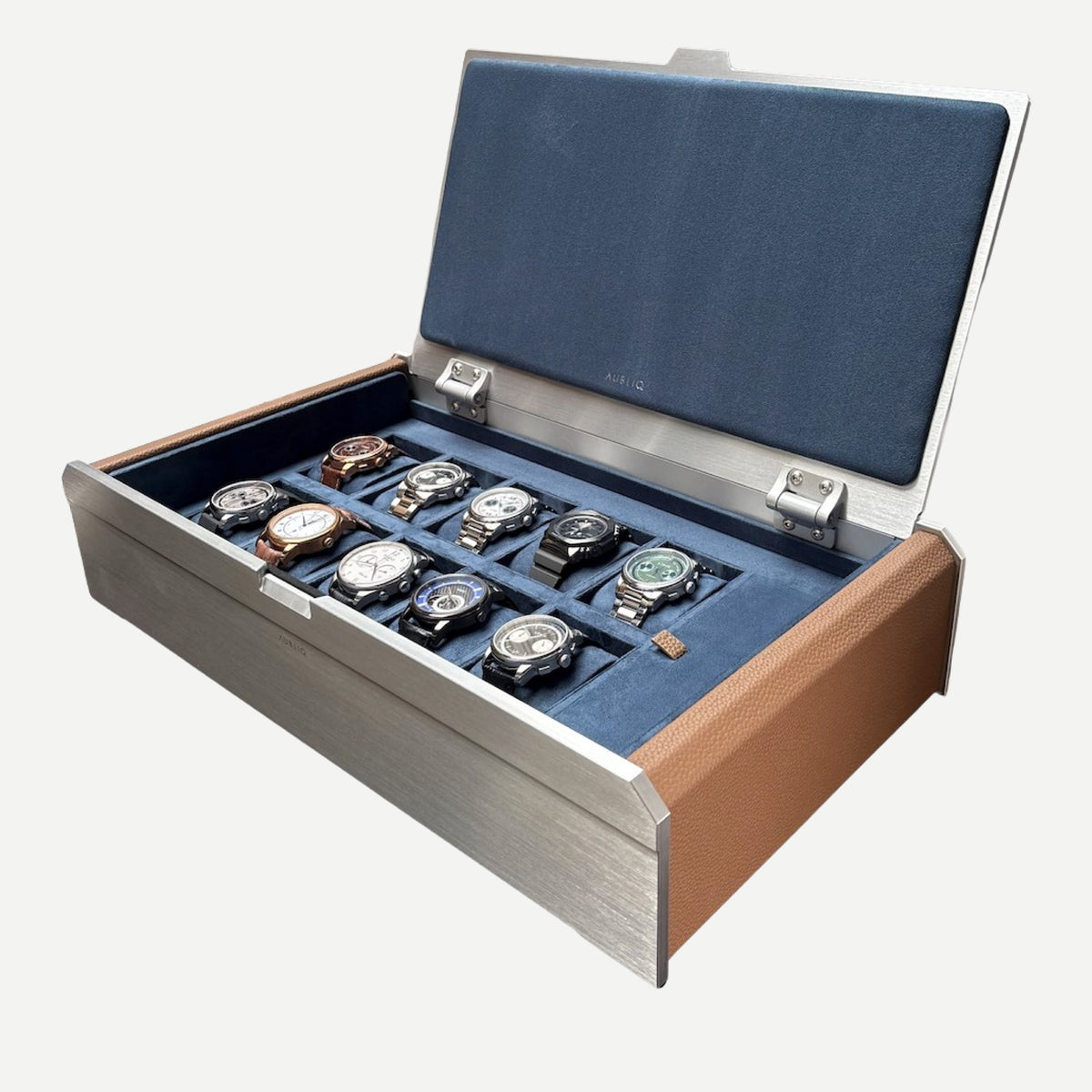 Open AUBLIQ silver 10-slot watch box with ten watches, blue lining, brown side panels and a covered strap compartment.