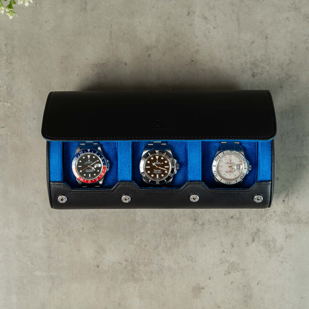 Black Blue watch roll for three watches open ly displaying three watches