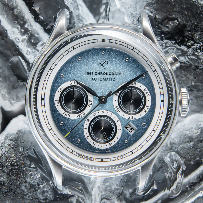 About Vintage 1564 Chronodate Automatic Ice Blue