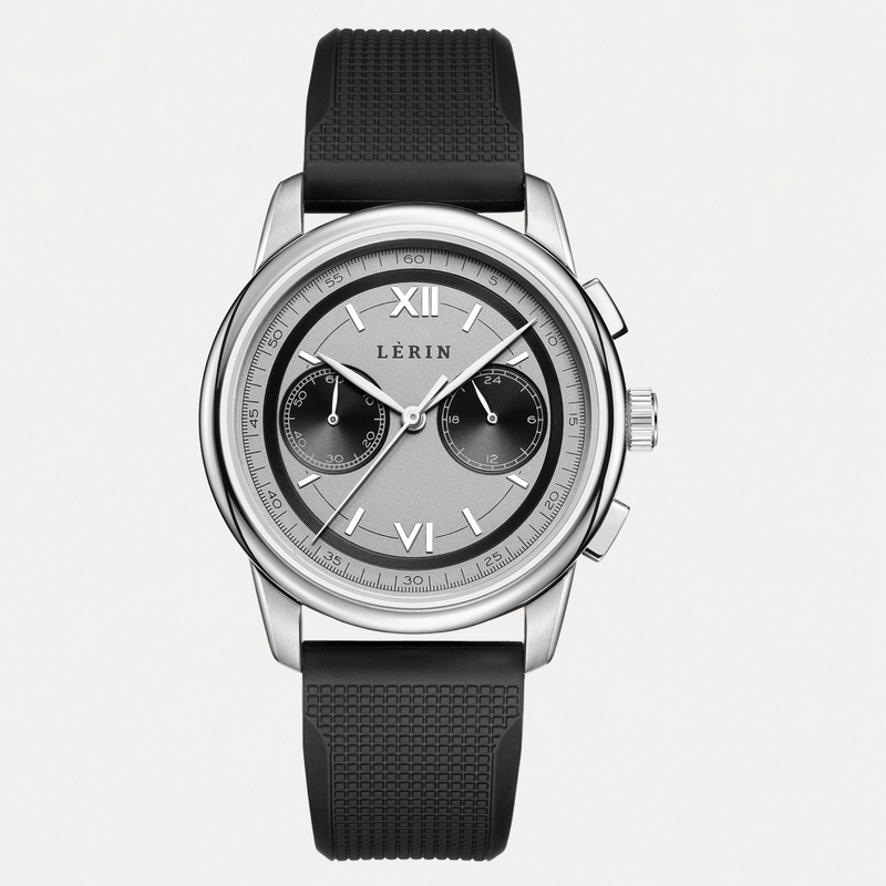A LERIN chronograph watch with a silver-tone stainless steel case, a textured black strap, and a silver dial with black sub-dials and Roman numeral hour markers.