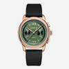 A wristwatch with a rose gold-toned case, a dark green dial featuring three subdials and Roman numeral hour markers, and a textured black strap, shown against a light gray background.